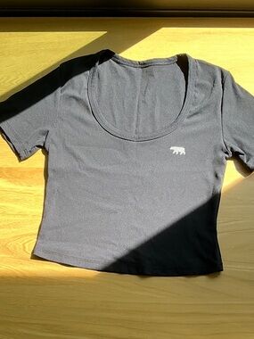 Running Bare Black Scoop Neck Cropped Tee with Bear Logo